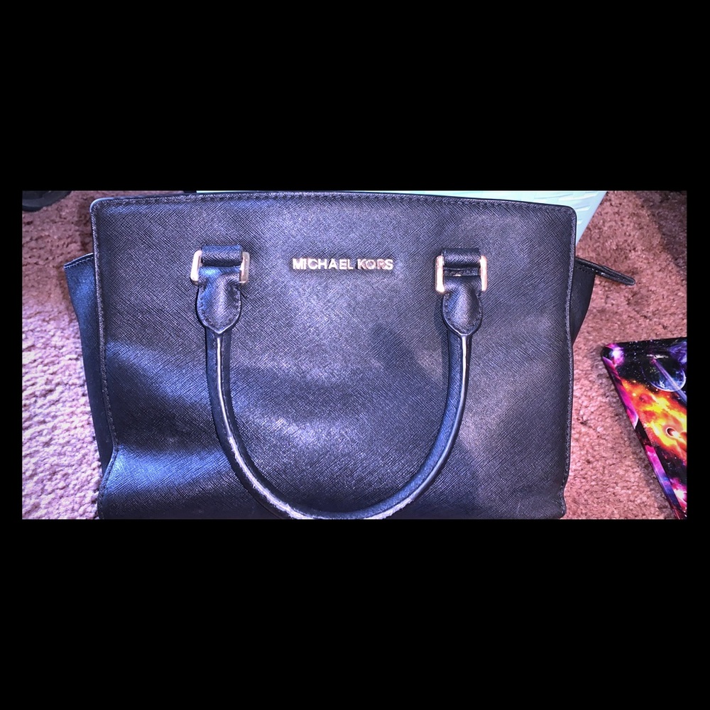 Real Micheal Kors purse an matching wallet